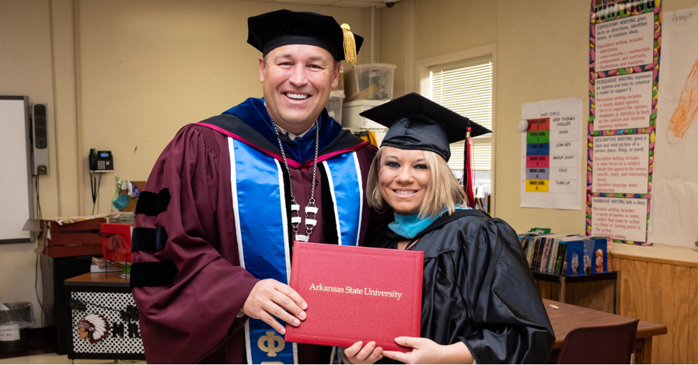 Chancellor Brings Commencement to Graduating Student
