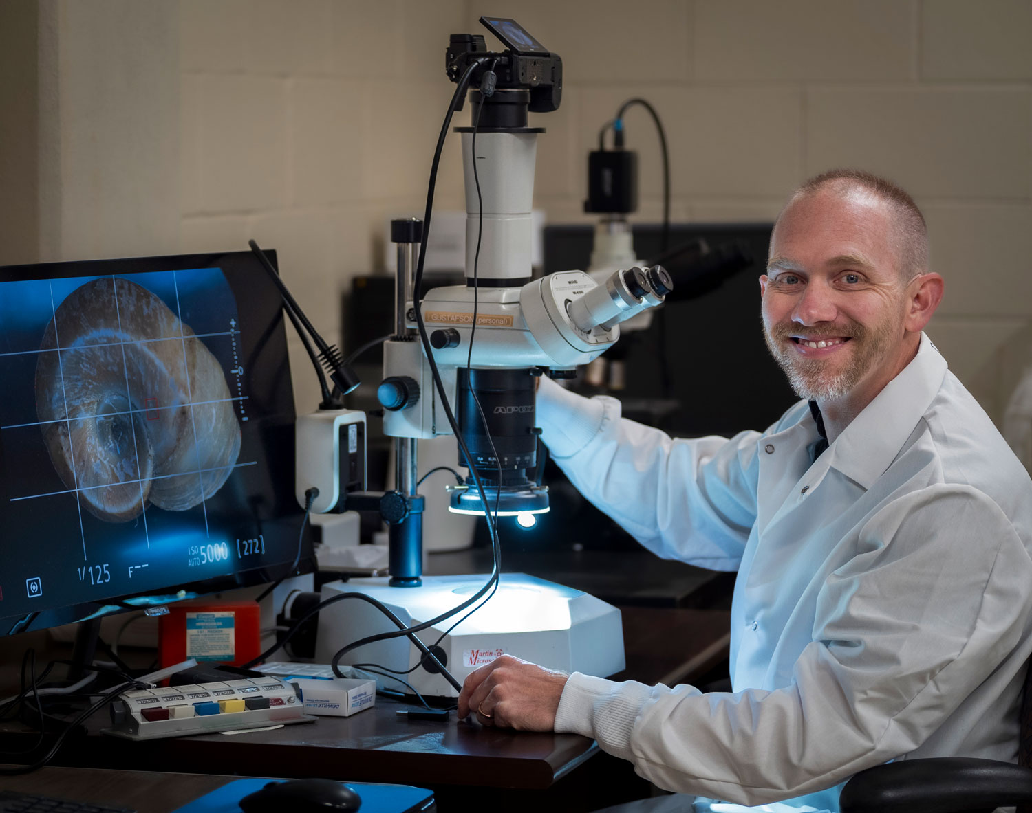 Image of Kyle Gustafson in lab