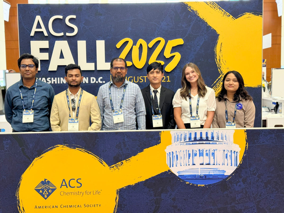 Image of students and Alam at ACS meeting