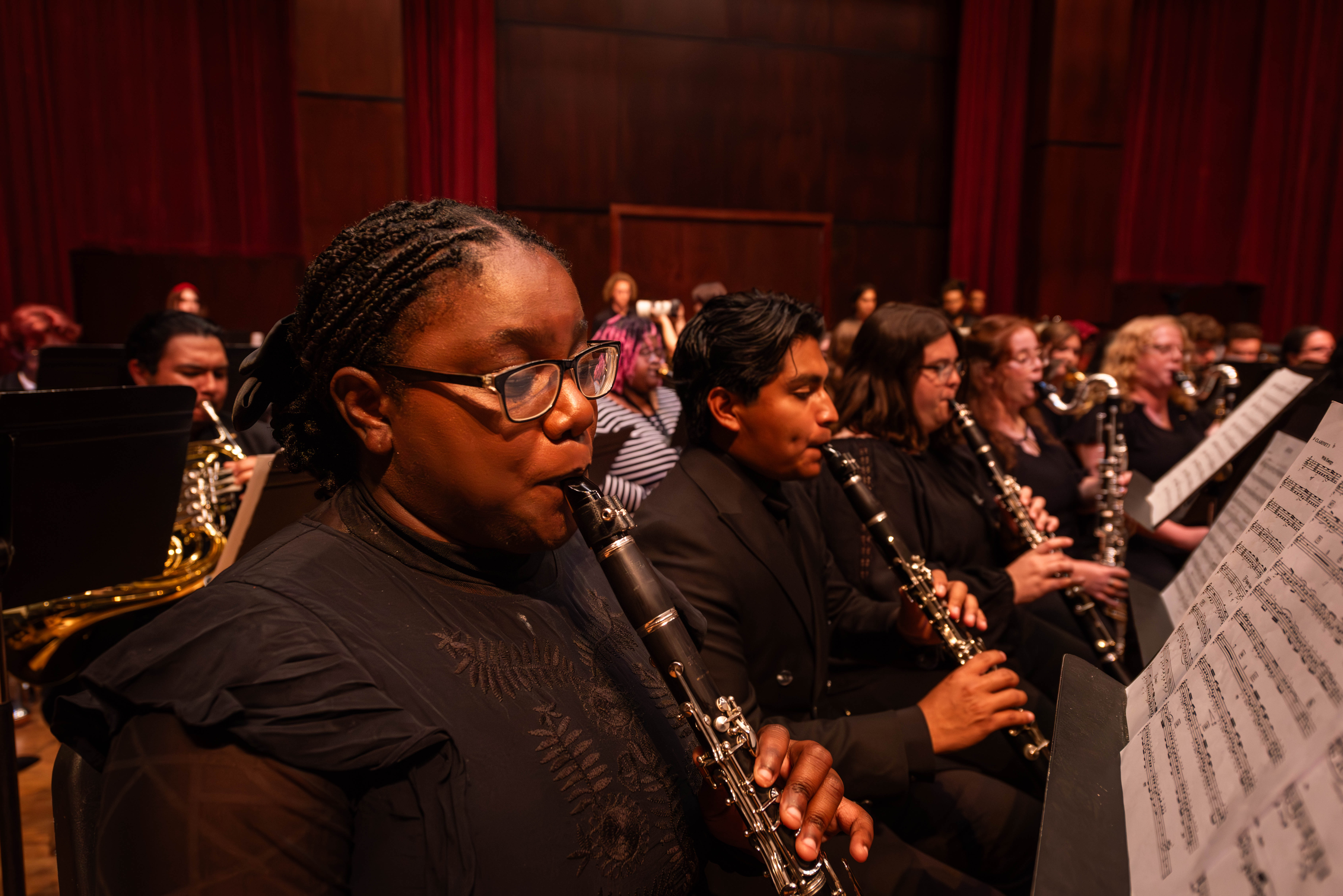 Clarinets performing in all black