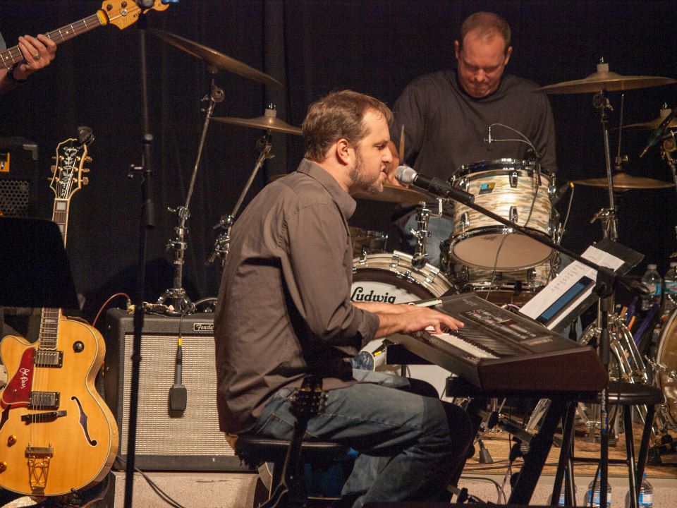 John T. Parks at keyboard